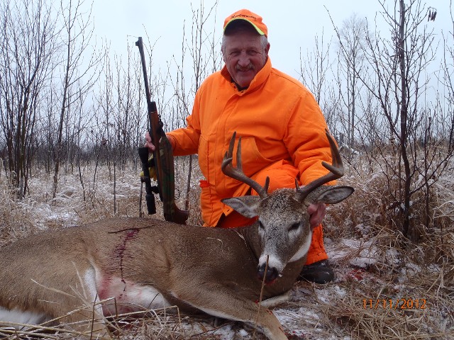 Hunter in Orange Camo