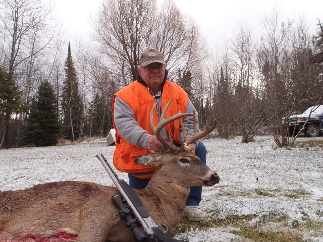 Deer Hunter in Orange Vest